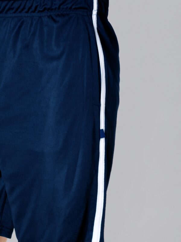 kaspy shorts - side closeup of navy color with white striped nylon shorts